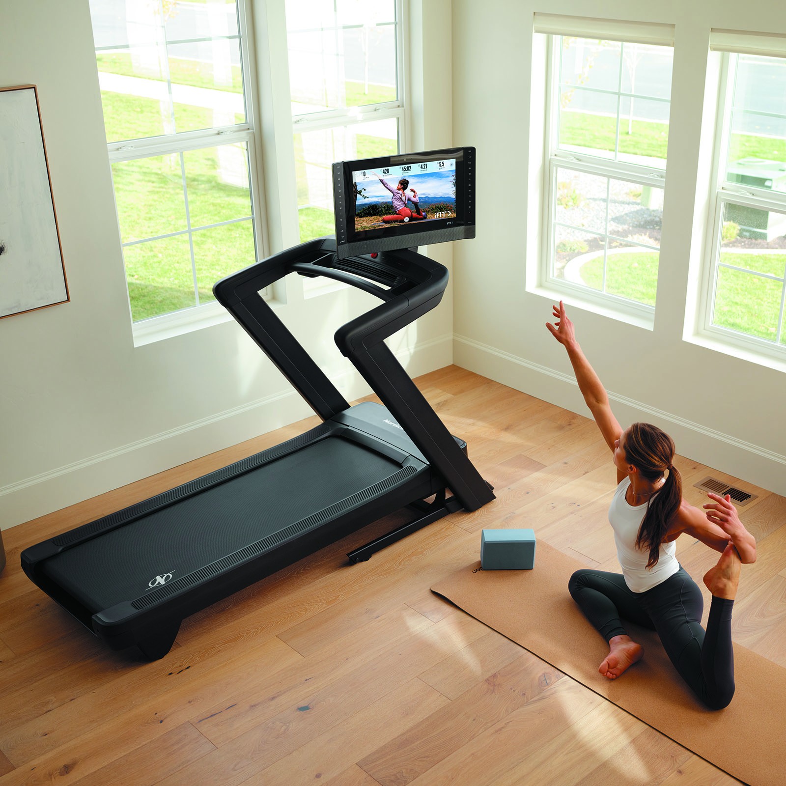 NordicTrack 2450Treadmill – iFIT in use yoga